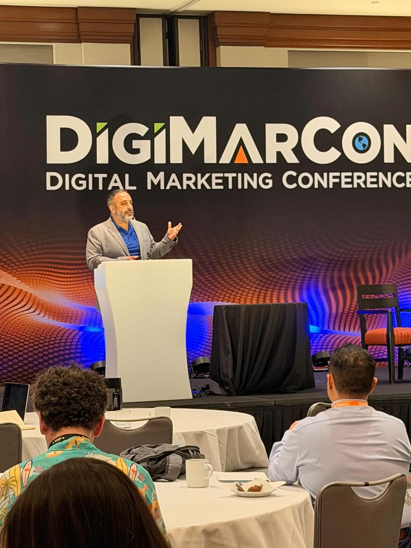 Al Sefati speaking at DigiMarCon 2026 on AEO & SEO in a Post-AI World